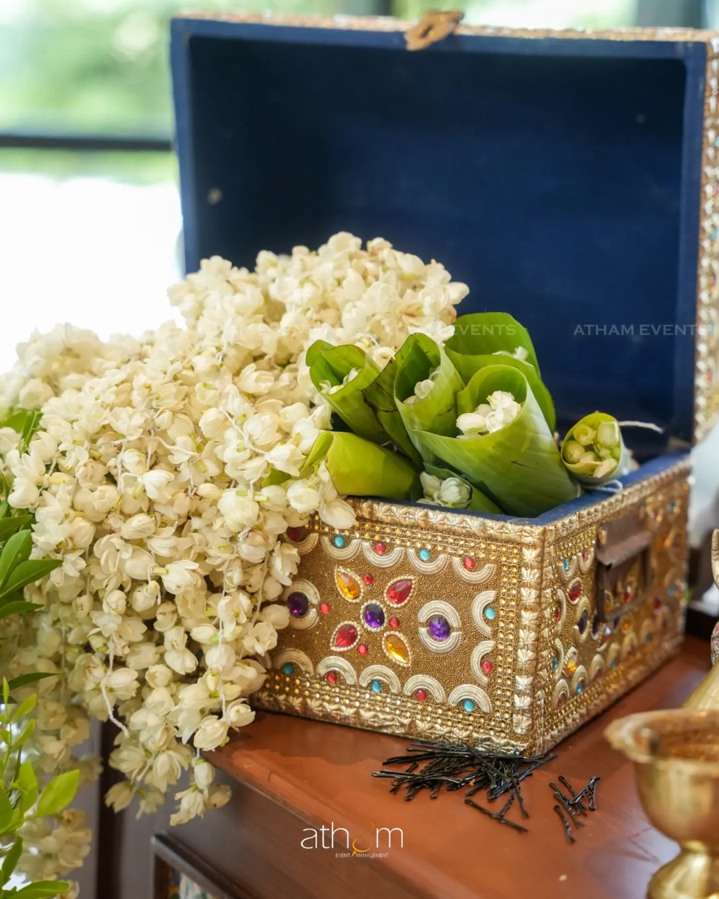 Bridal styling accessories, jasmine flowers, and heirloom jewellery box